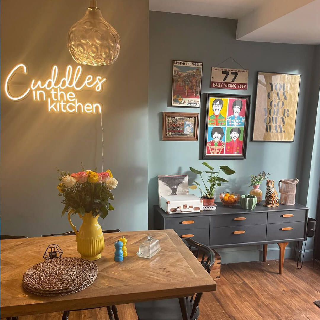 Cuddles in the kitchen neon sign