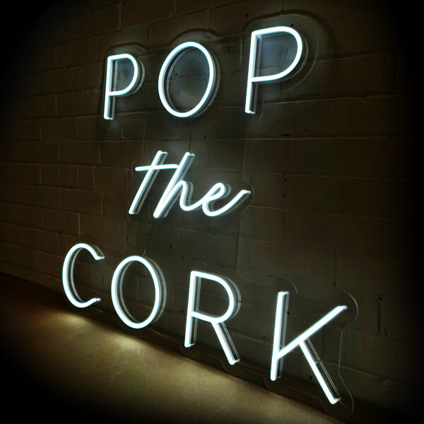 Pop The Cork neon sign