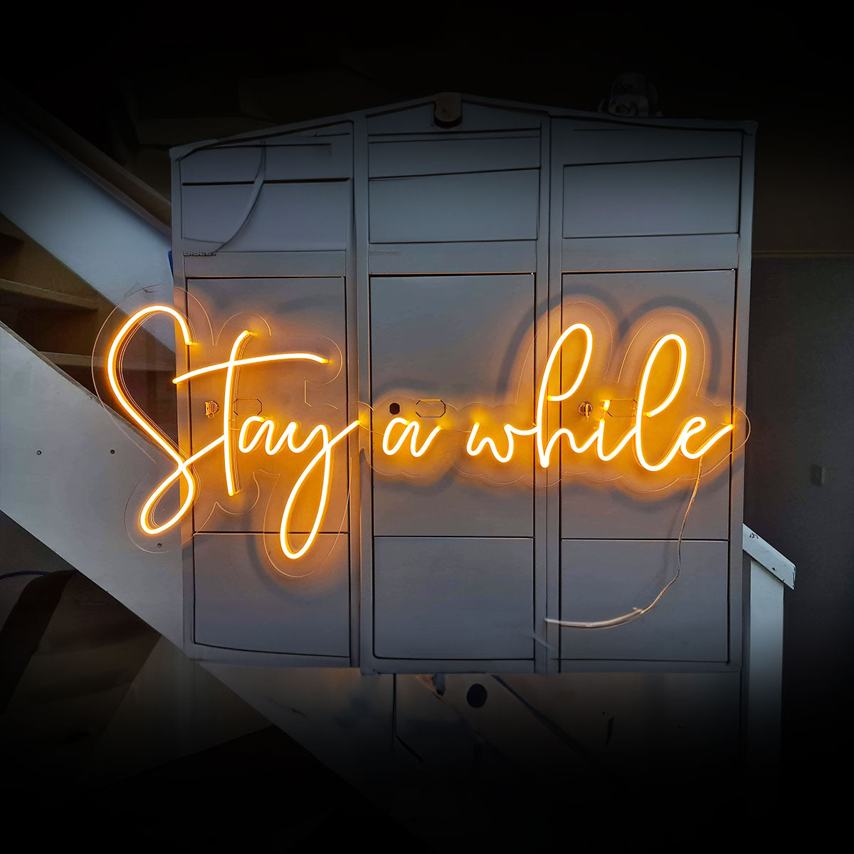 Stay A While neon sign