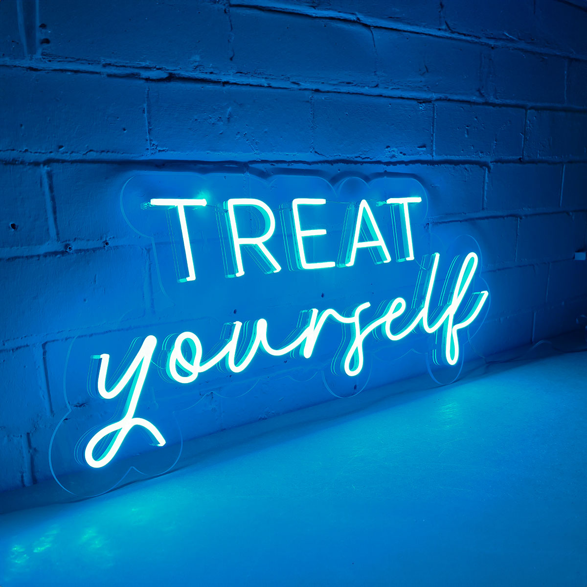 Treat Yourself neon sign