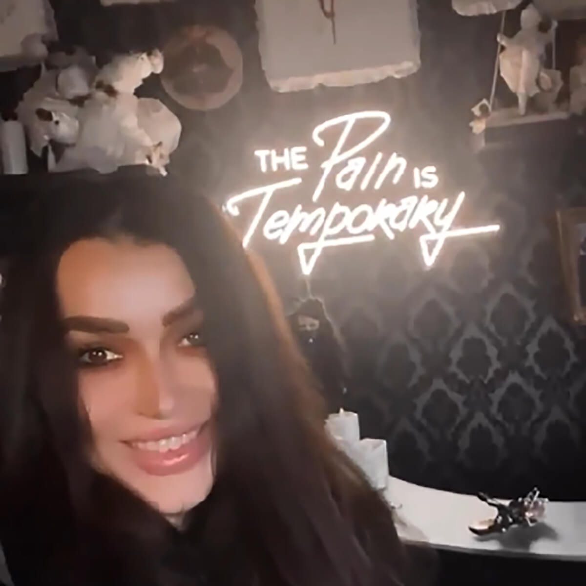 The pain is temporary neon sign